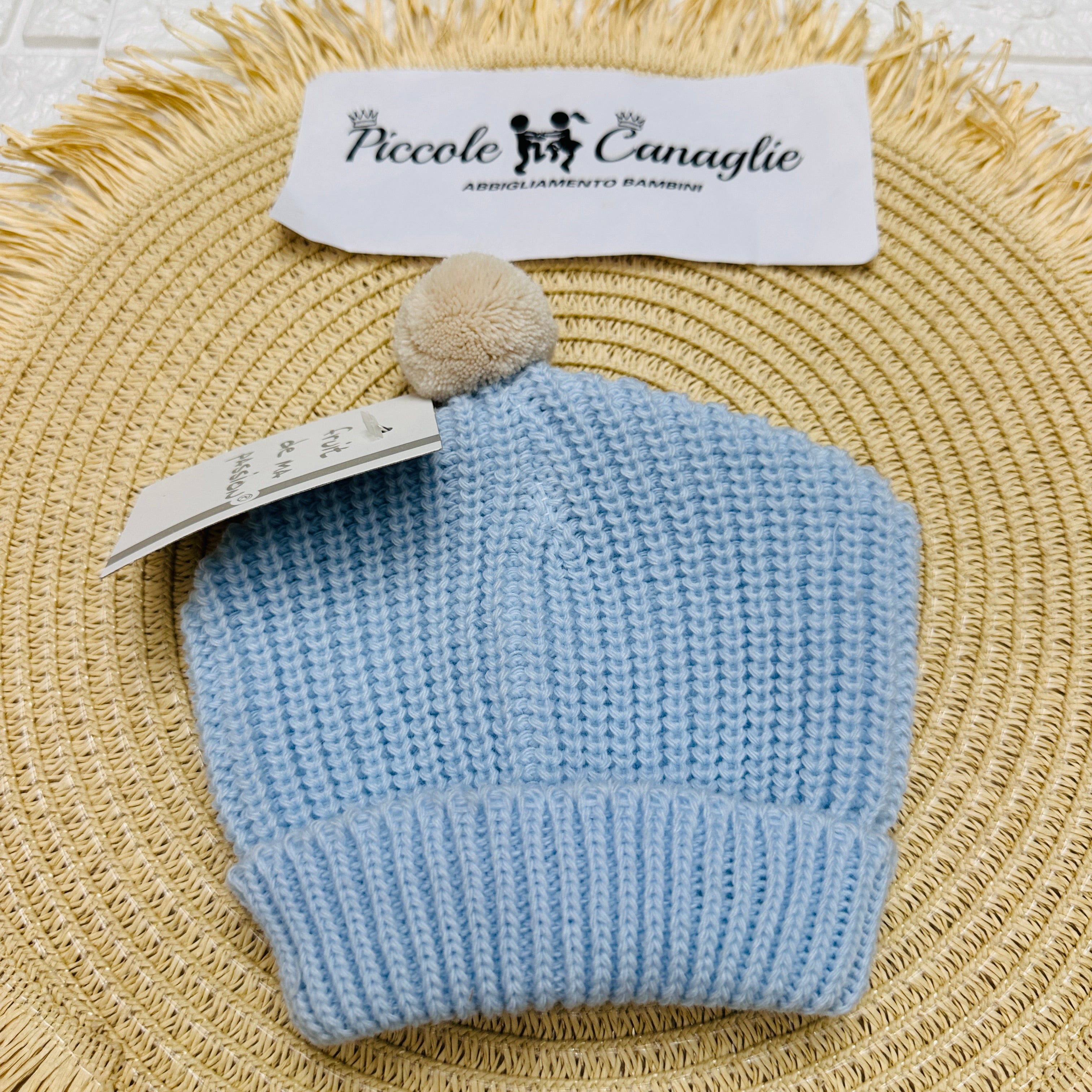 Cappellino PonPon celeste/Bigie Taglia 0-6mesi