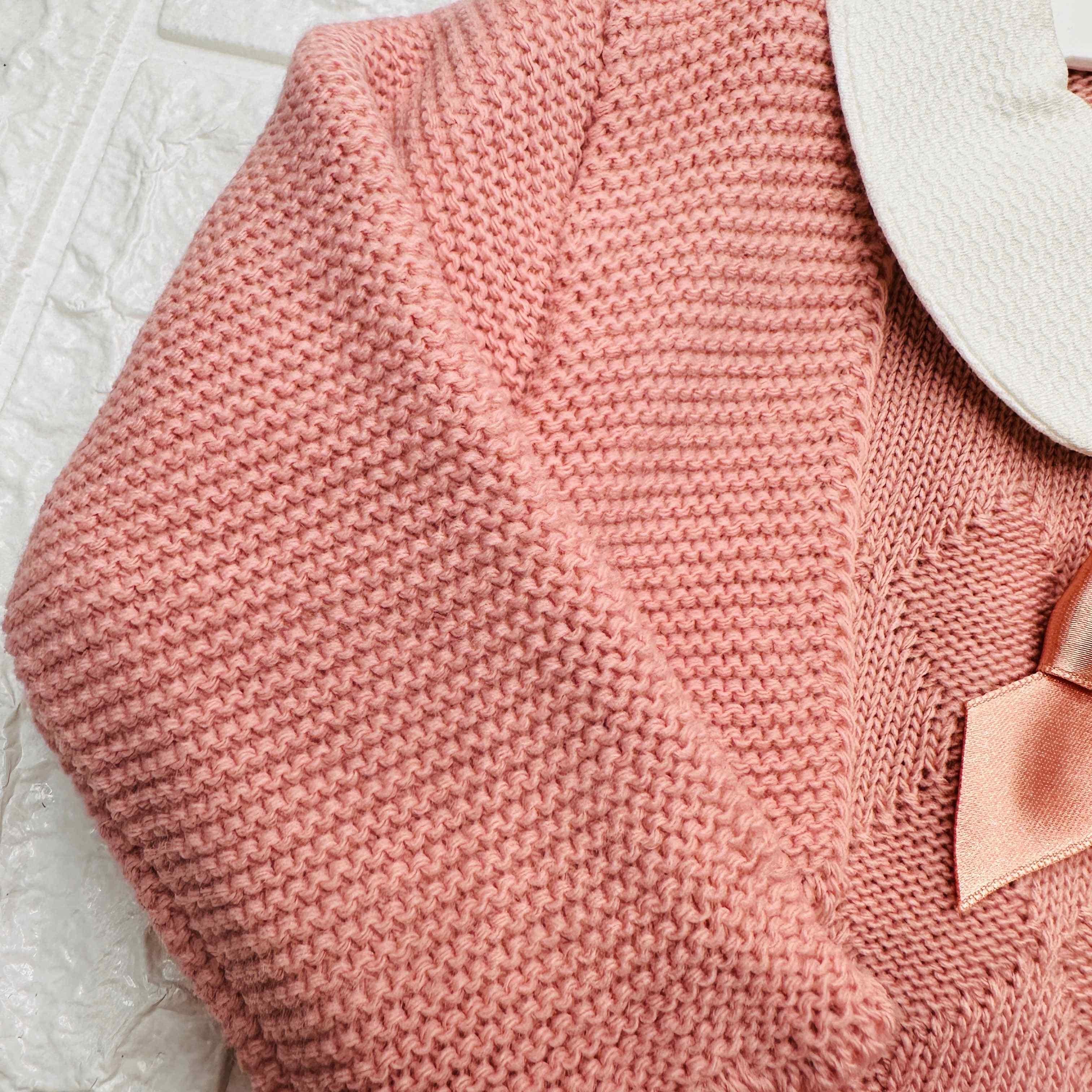 Vestitino e scaldacuore rosa