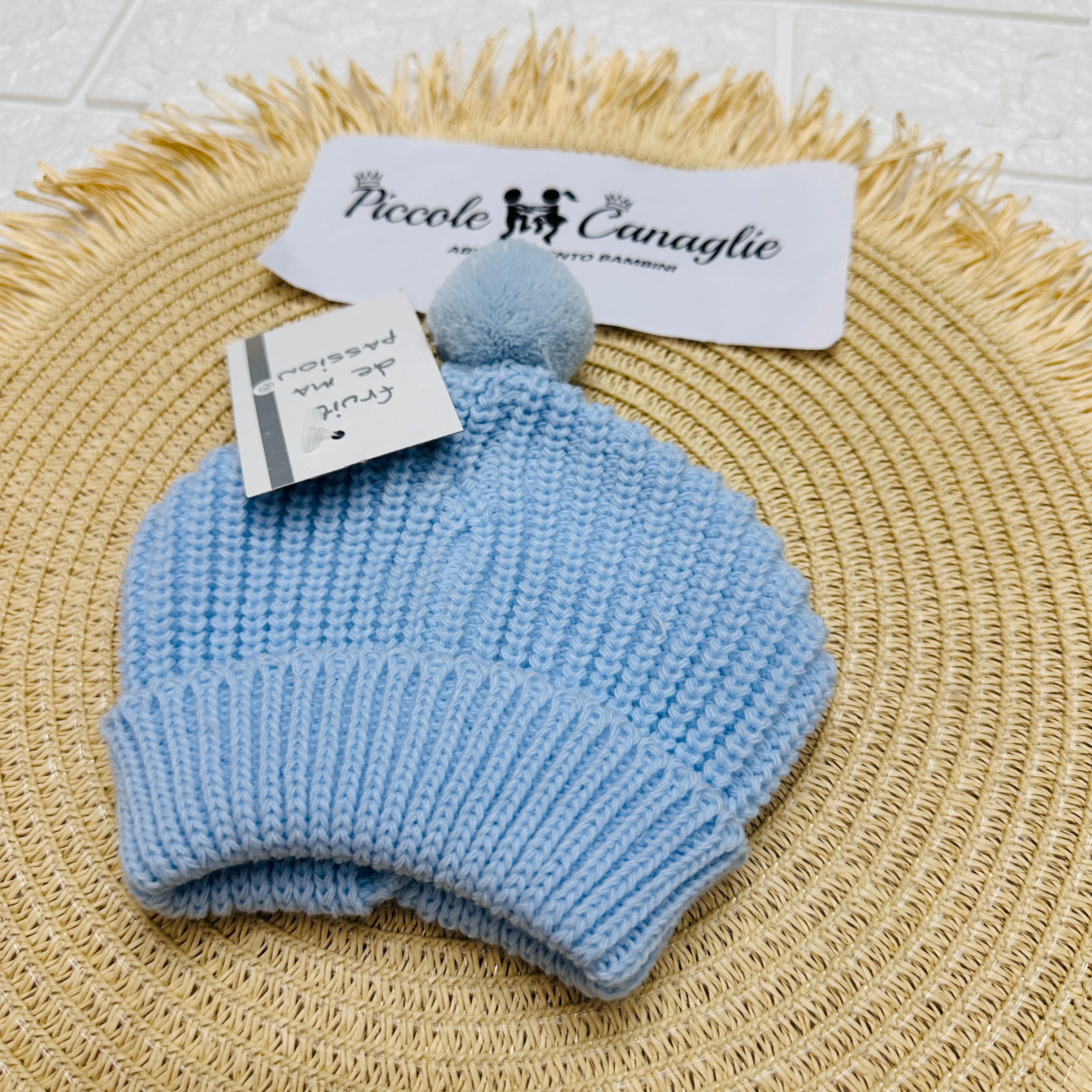 Cappellino PonPon celeste Taglia 0-6mesi