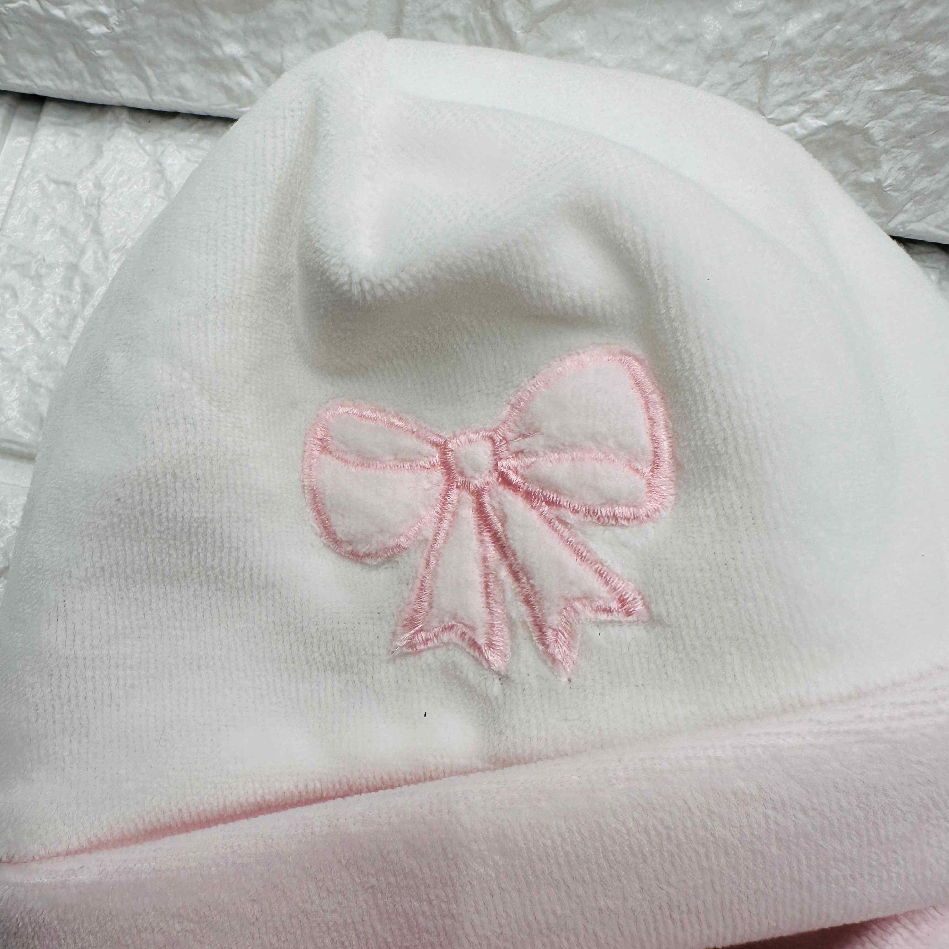 Cappello e babbucce ciniglia fiocco rosa