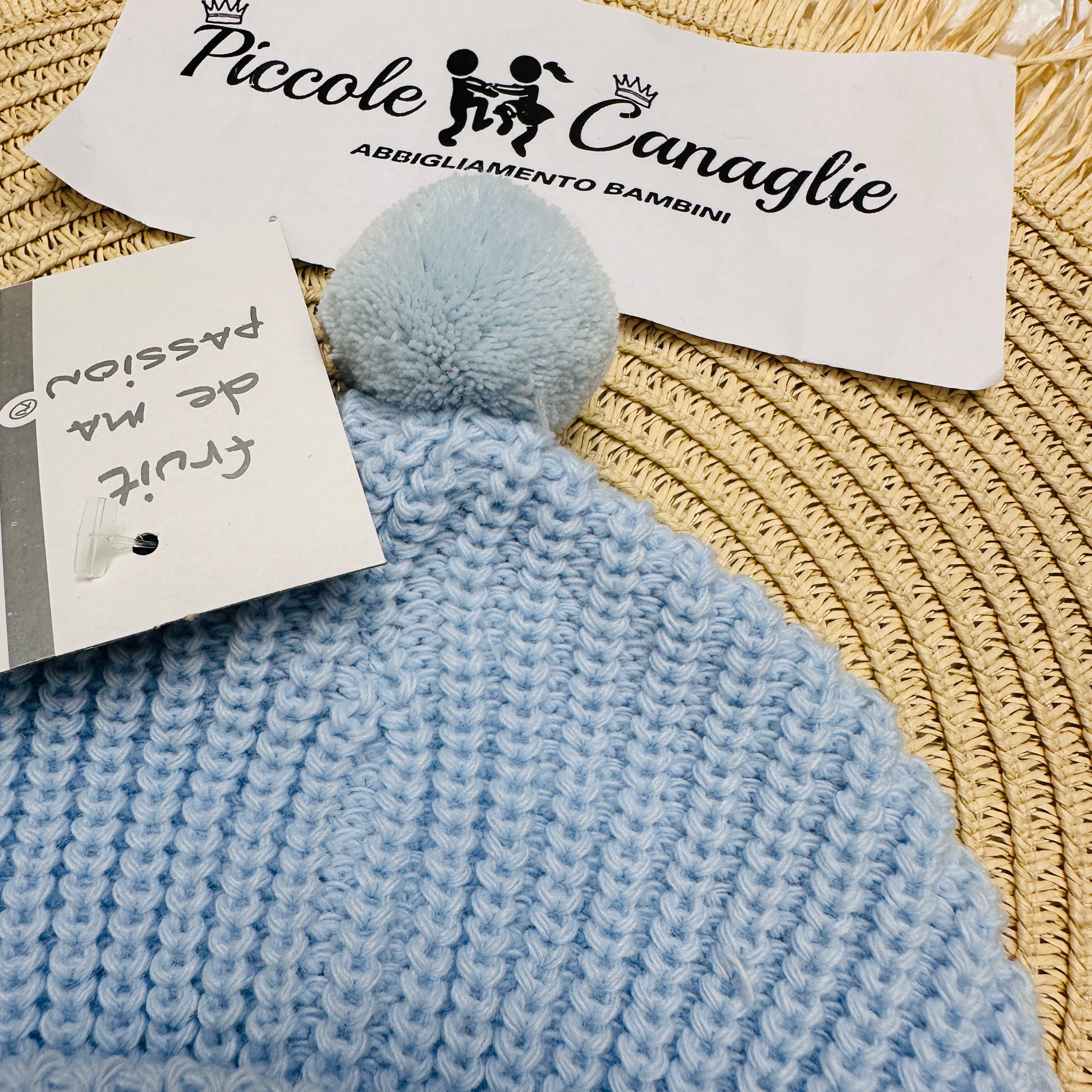 Cappellino PonPon celeste Taglia 0-6mesi