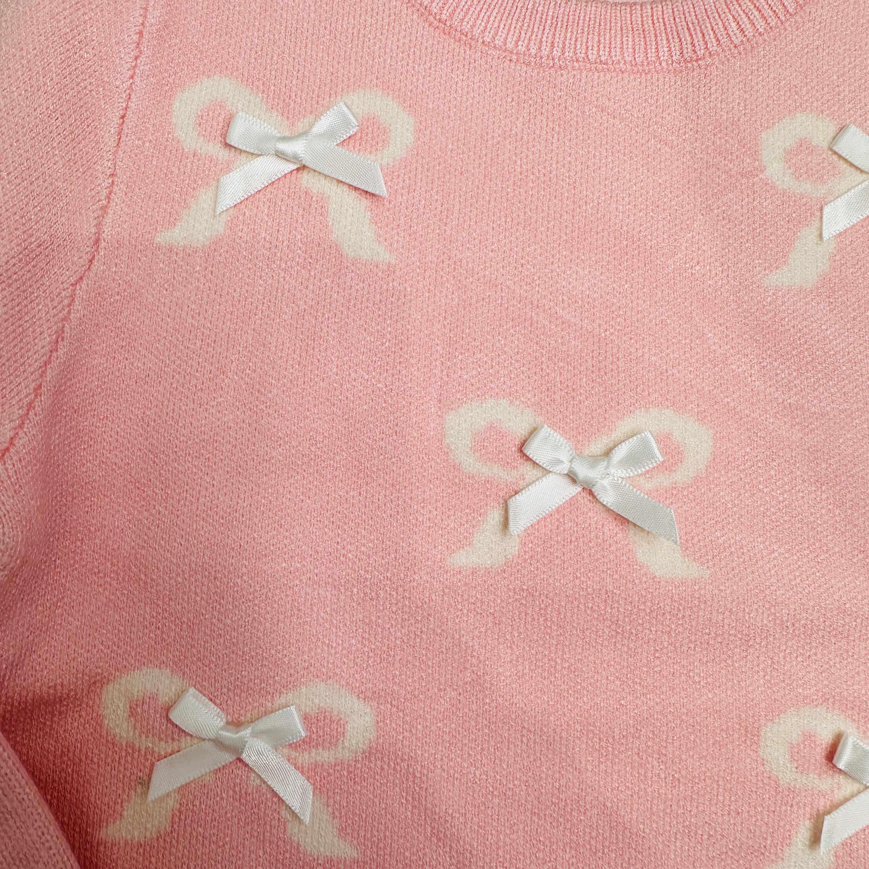 Maglioncino fiocchetti rosa
