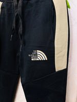 Tuta Felpata modello North Face@ Nera e verde - Piccole Canaglie - PC24138